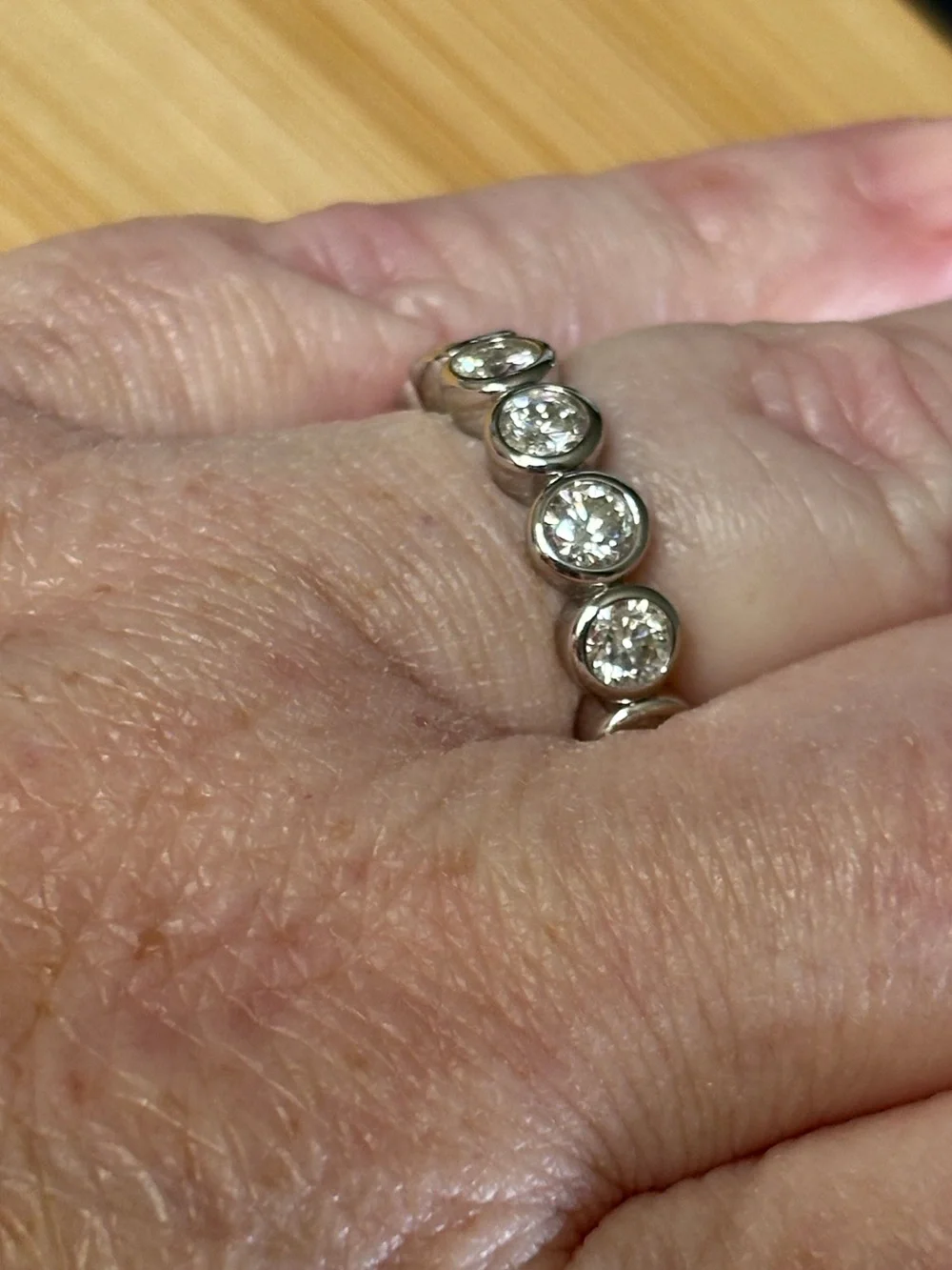 Moissanite eternity ring with .50ct stones in 935 Argentium silver! So sparkly!